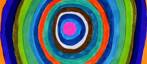 Concentric circles in bright and bold colors: shades of green, blue and red. 