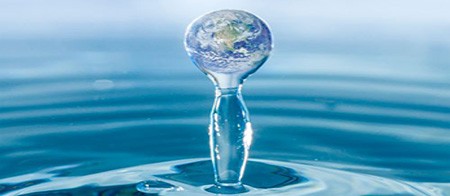 A composite photo of the Earth inside a drop of water